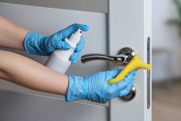 Cleaning a doorknob!  